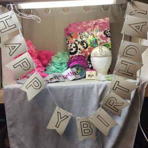 8th birthday party with birthday banner , small decor, tiara and sash